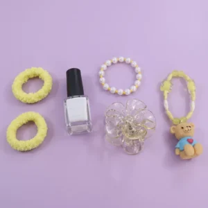 beauty essentials & hair accessories kit with bracelet and nail polish