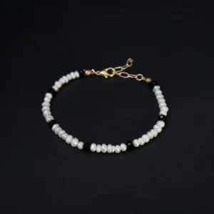 noir accent delicate pearl strand bracelet